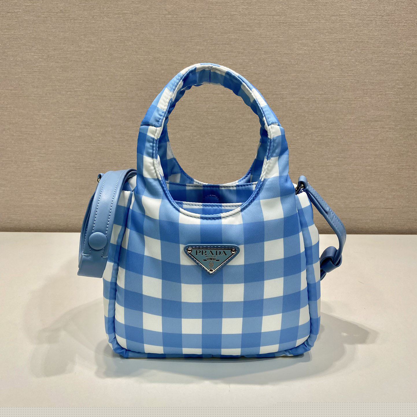 Pra*a top handle bags